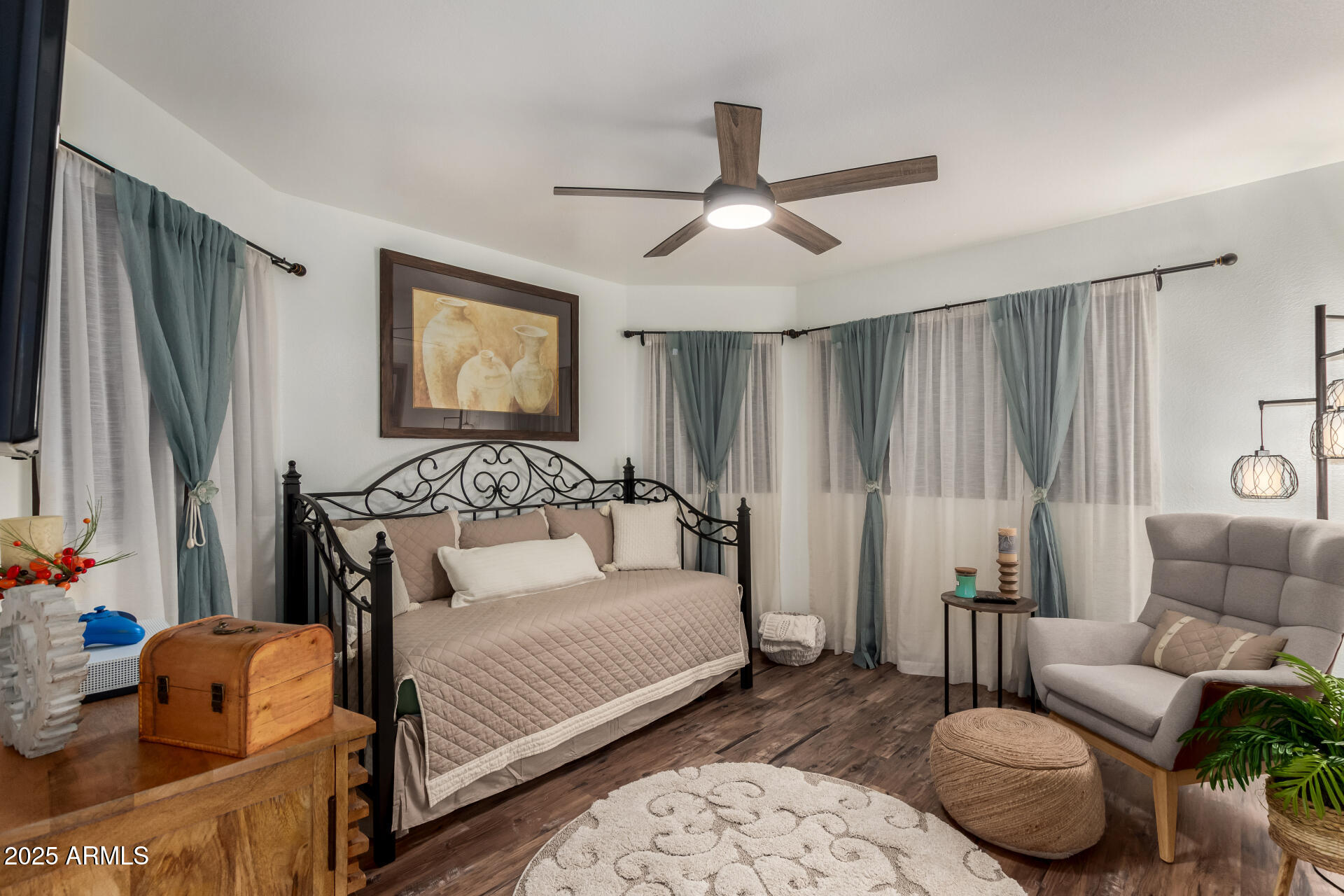 5956 East Phelps Road Scottsdale, AZ 85254 - Photo 43 of 60 a bedroom with a bed couch and a window