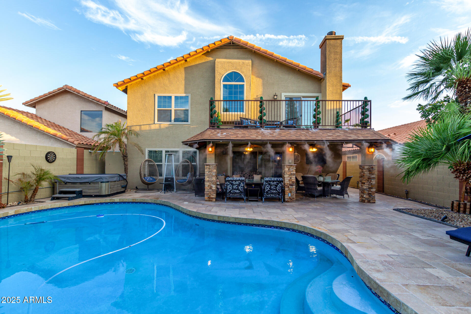 5956 East Phelps Road Scottsdale, AZ 85254 - Photo 52 of 60 a view of a house with sitting area and sitting area