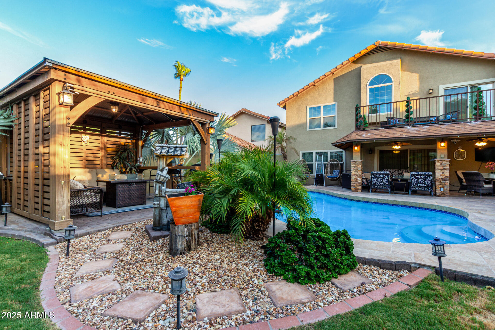 5956 East Phelps Road Scottsdale, AZ 85254 - Photo 54 of 60 a front view of a house with patio