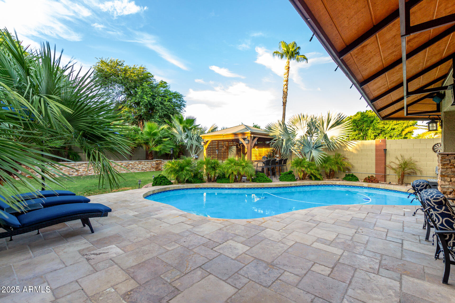 5956 East Phelps Road Scottsdale, AZ 85254 - Photo 56 of 60 a view of an outdoor space and swimming pool