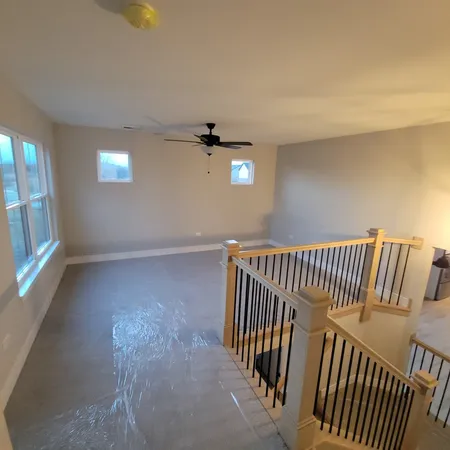 an empty room with windows