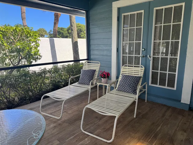 an aerial view of a residential houses with outdoor space