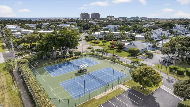 a view of a swimming pool with a lounge chairs