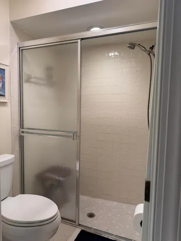 a bedroom with a bed and furniture