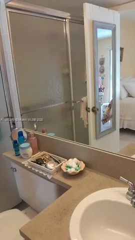 a view of a door and a window