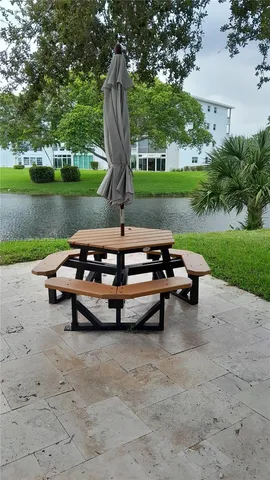 a view of building with yard in background