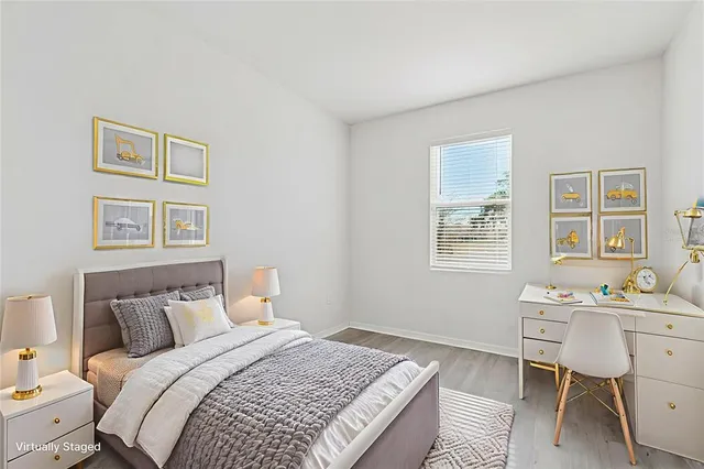 a view of a city with lawn chairs and palm trees