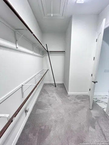 a view of a room with rack on the wall