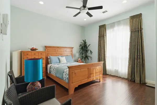 a bed room with a bed and a window