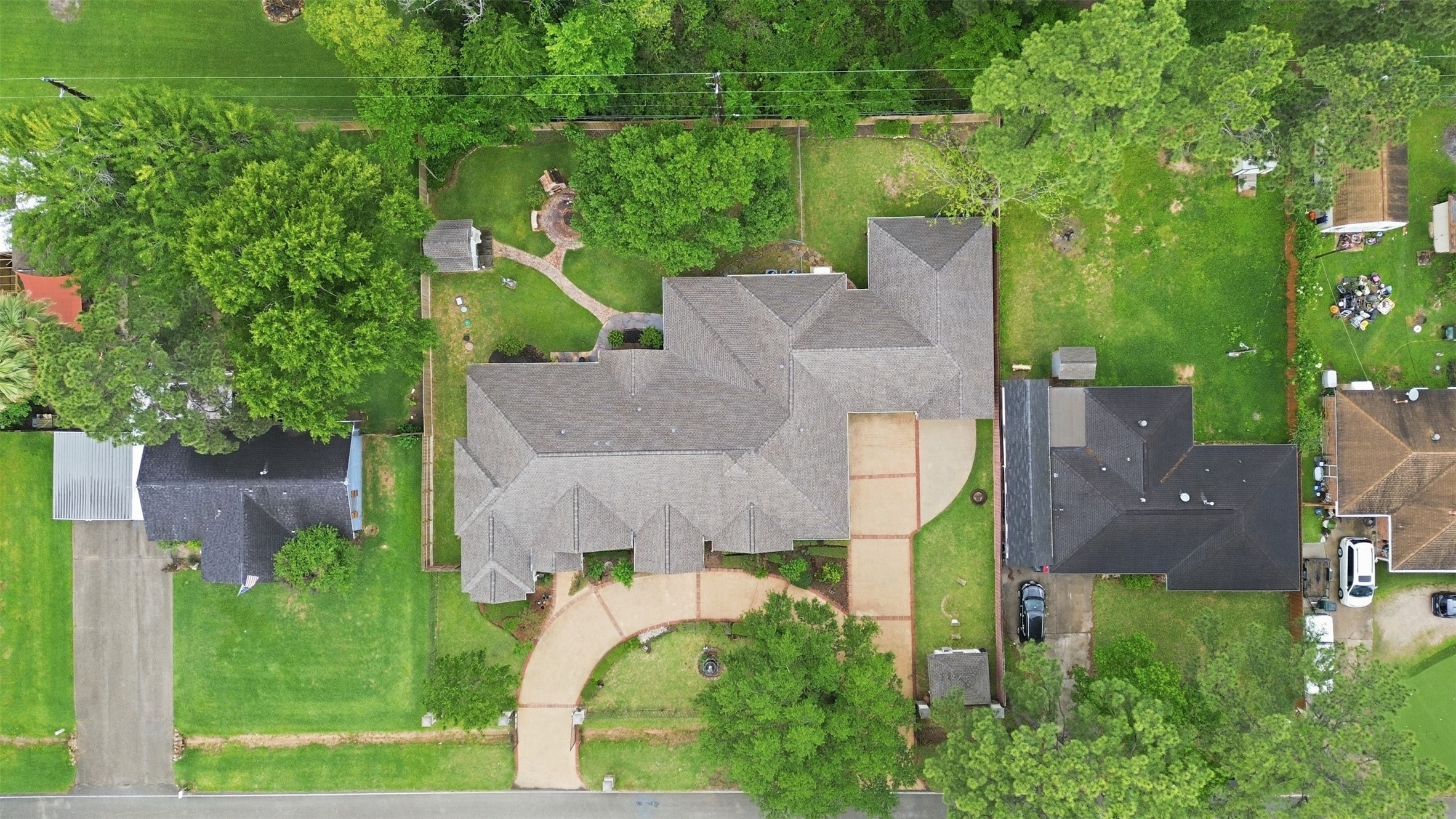 21411 Stargrass Drive Spring, TX 77388 - Photo 23 of 24 Stunning aerial shot of this 0.78-acre double lot. Plenty of room for a private pool, playground, or additional structures while maintaining a vast, open lawn.