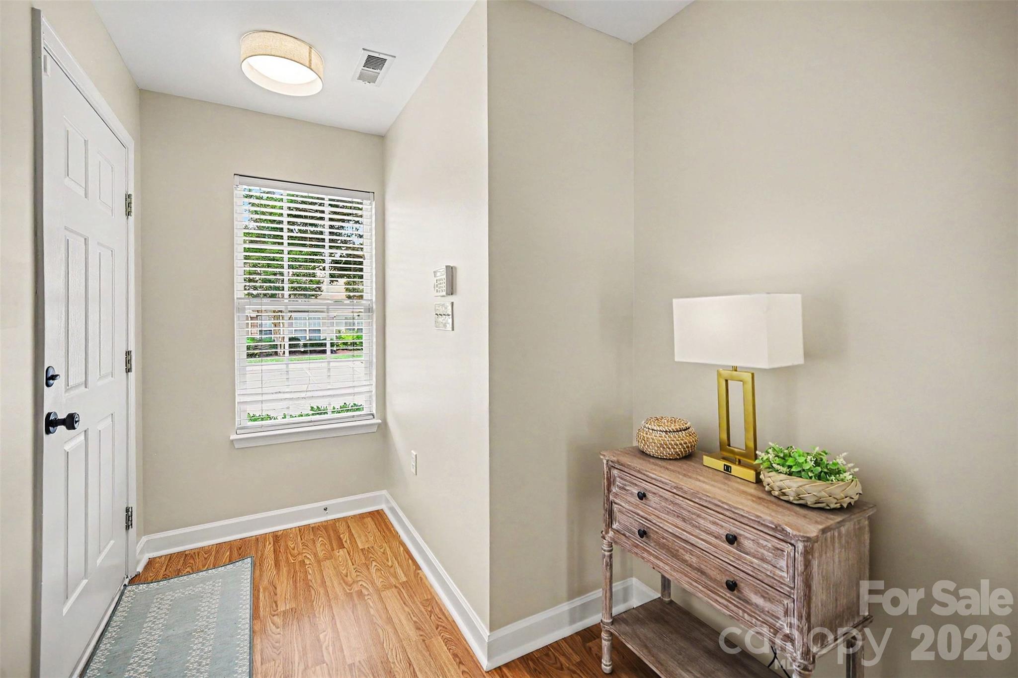 1210 Sheldon Brook Lane Fort Mill, SC 29707 - Photo 12 of 26 a room with window and a table