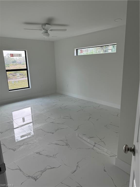 2530 Catron Circle Lehigh Acres, FL 33971 - Photo 18 of 27 a view of a hallway