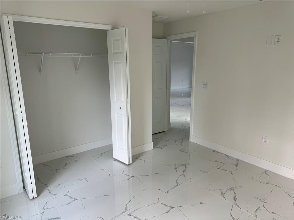 2530 Catron Circle Lehigh Acres, FL 33971 - Photo 20 of 27 an empty room with a empty space