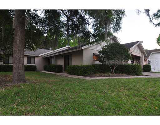 340 Spring Run Circle Longwood, FL 32779 - Photo 1 of 1 Exterior Front - Corner Lot, large front and side yard, huge trees, mature landscaping