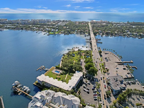 an aerial view of a house with a lake view