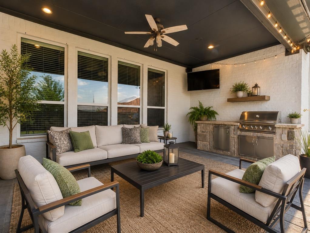 4003 Marble Hill Road Frisco, TX 75034 - Photo 12 of 40 a living room with furniture kitchen view and a large window