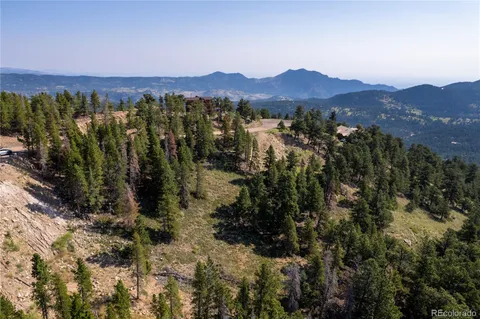 a view of a city with mountains in the background