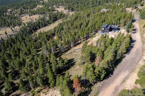 a view of a garden with a pathway