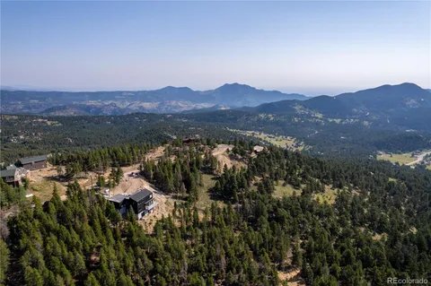 a view of a city with mountain
