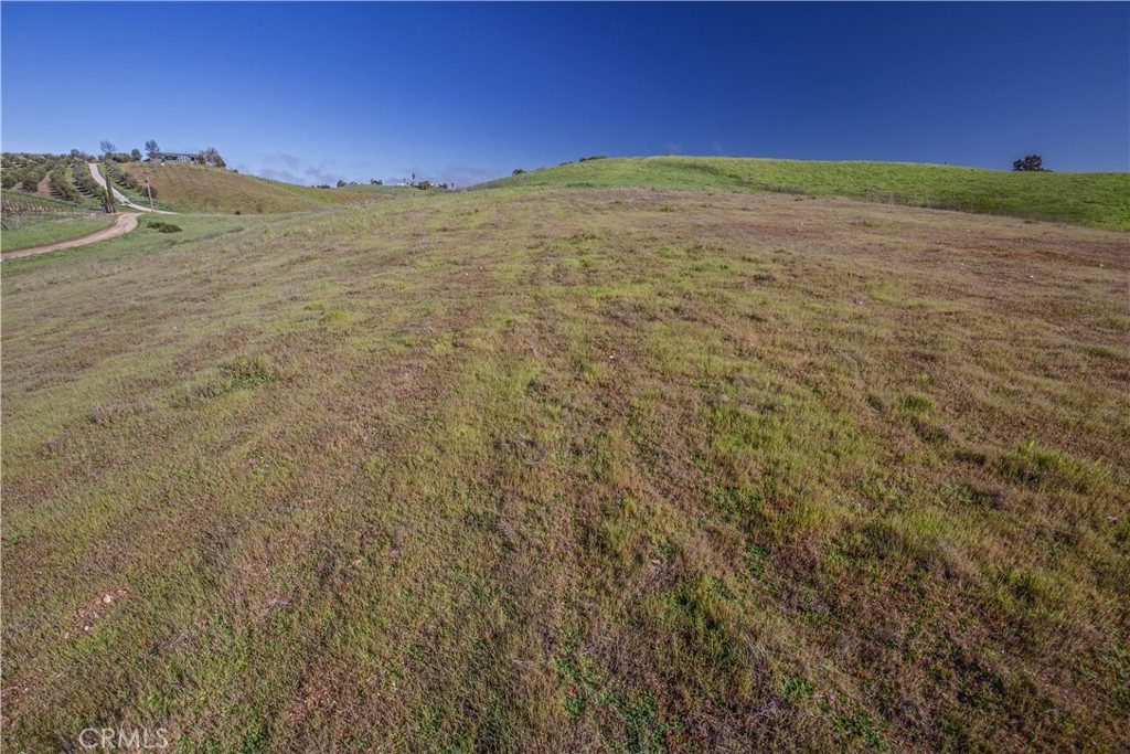1641 Sutliff Road Paso Robles, CA 93446 - Photo 18 of 44 a view of a large building with mountains in the background