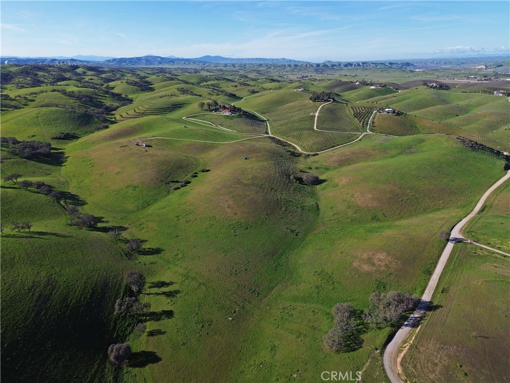 1641 Sutliff Road Paso Robles, CA 93446 - Photo 41 of 44 an aerial view of residential houses with outdoor space and river