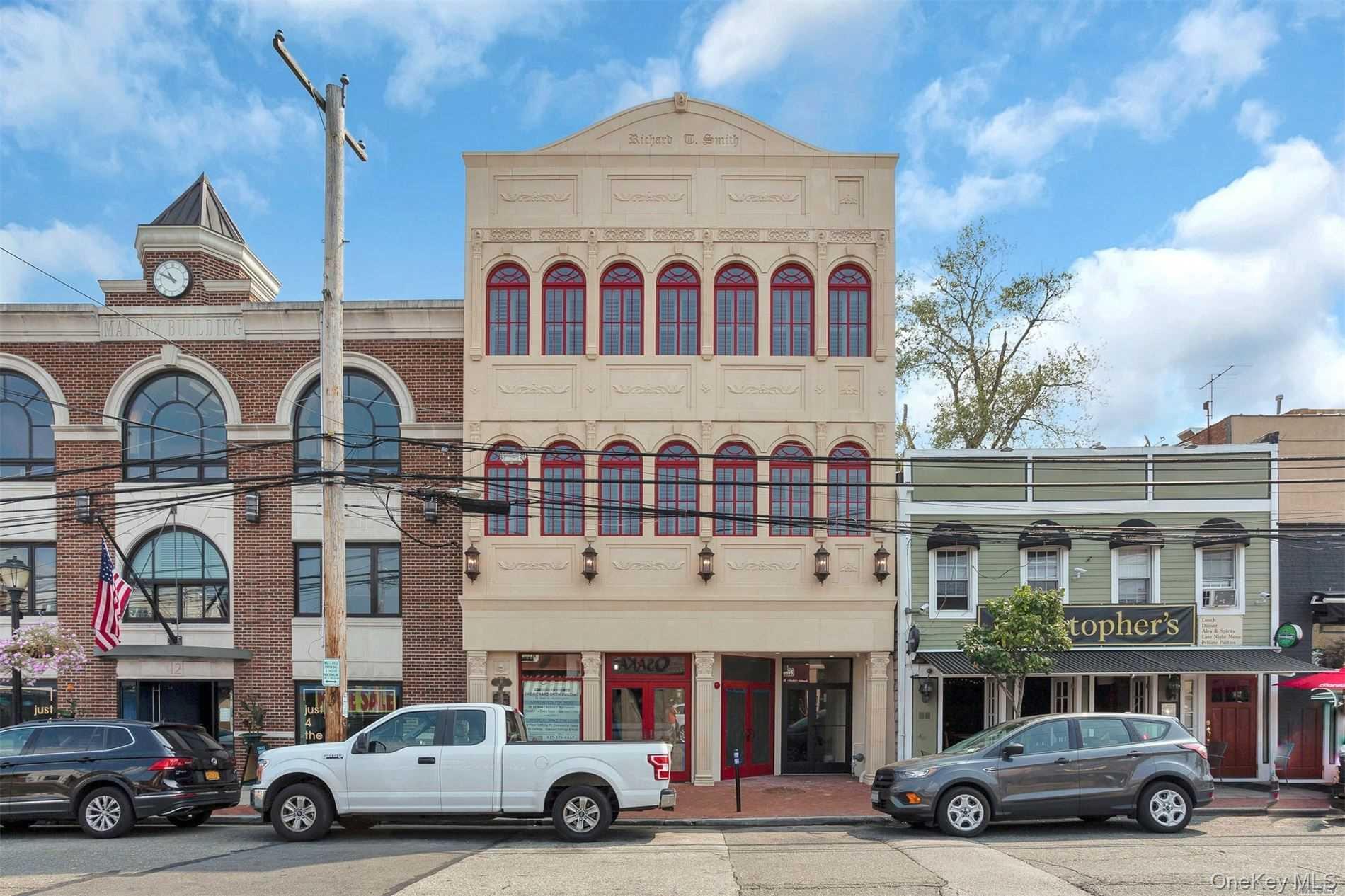 10 Wall Street, Unit 3A Huntington, NY 11743 - Photo 1 of 22 a car parked in front of a building