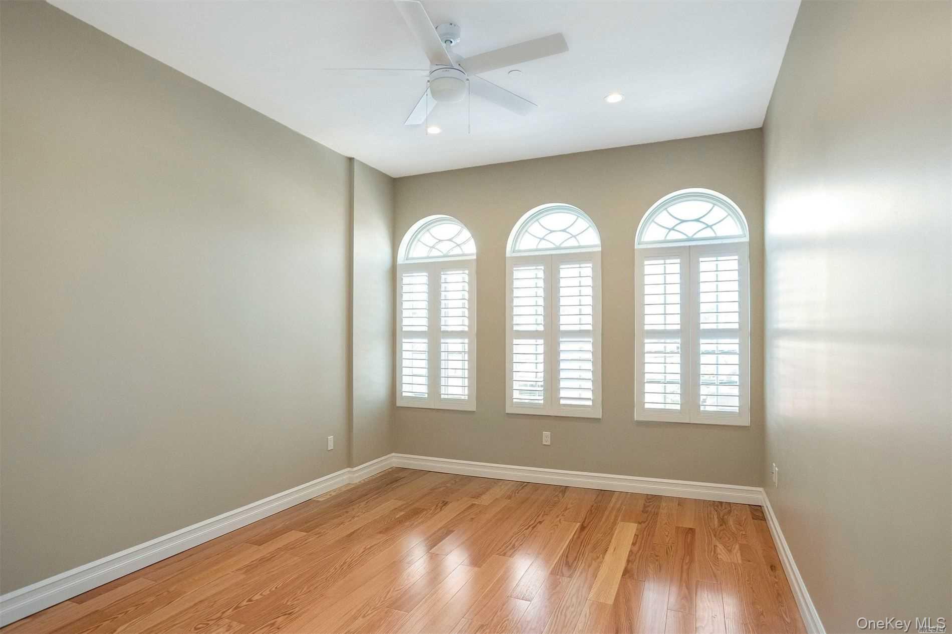 10 Wall Street, Unit 3A Huntington, NY 11743 - Photo 14 of 22 an empty room with a window