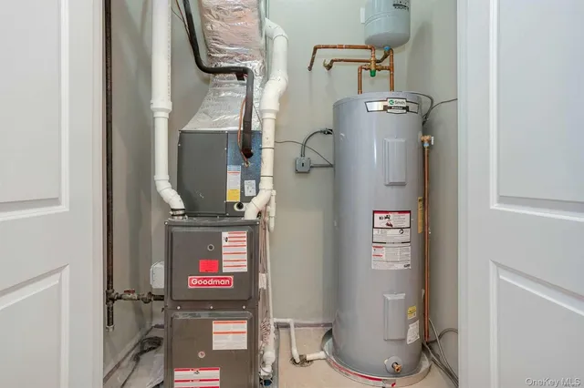 a room with water heater and storage