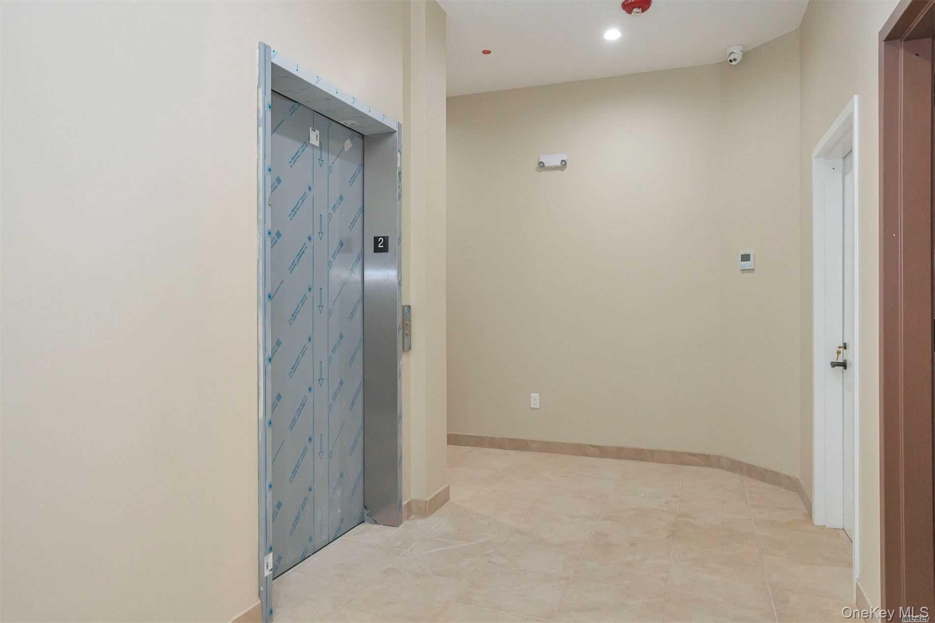 10 Wall Street, Unit 3A Huntington, NY 11743 - Photo 20 of 22 a view of an empty room