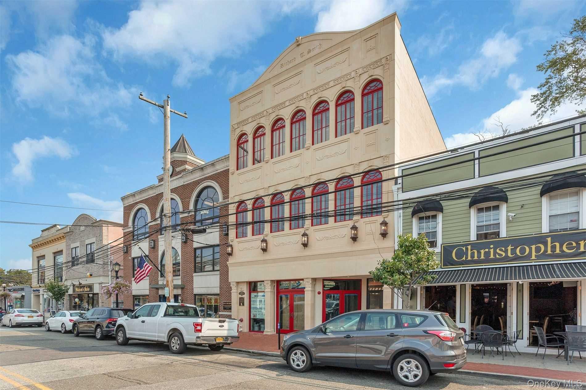 10 Wall Street, Unit 3A Huntington, NY 11743 - Photo 22 of 22 a car parked in front of a building