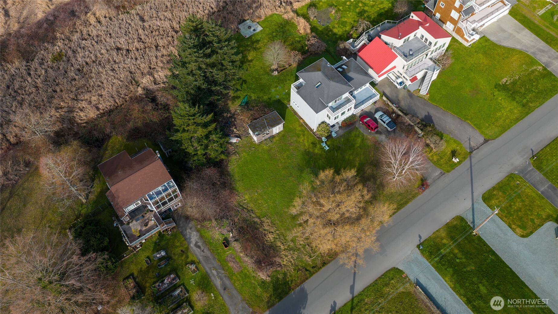 0 Shore Avenue Freeland, WA 98249 - Photo 6 of 20 an aerial view of a house with a yard