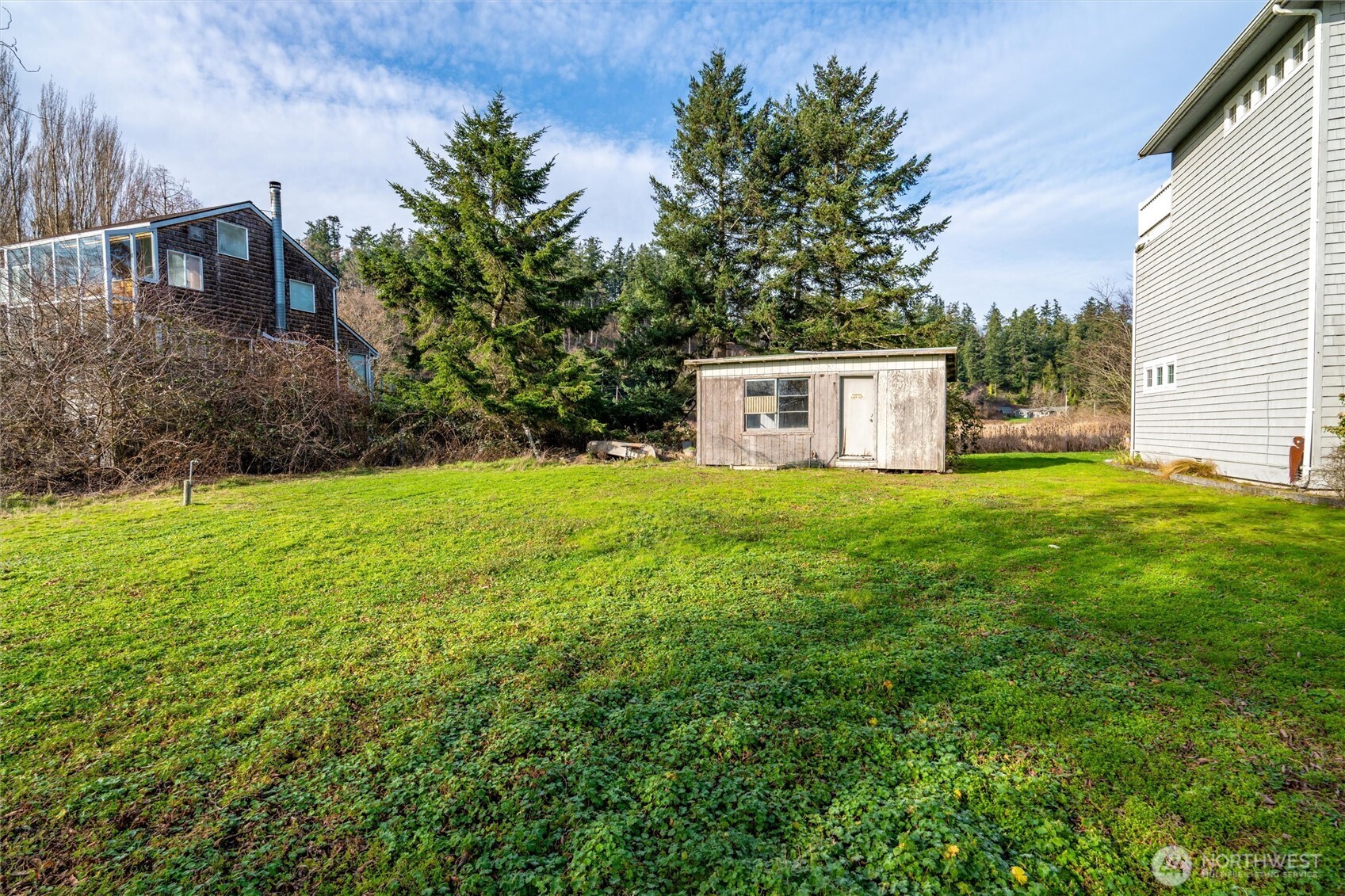 0 Shore Avenue Freeland, WA 98249 - Photo 8 of 20 a view of a house with a yard
