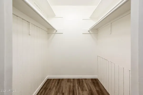 a view of a room with racks on the wall