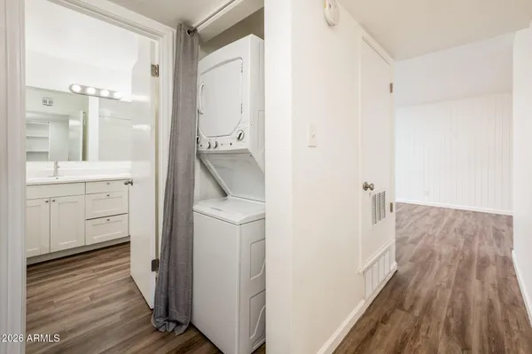 a bathroom with a sink and mirror
