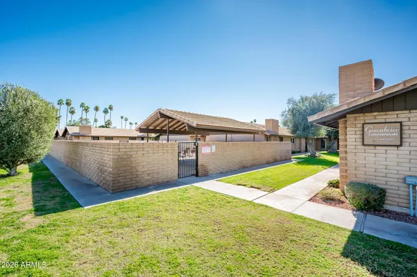 a view of a backyard with a small house