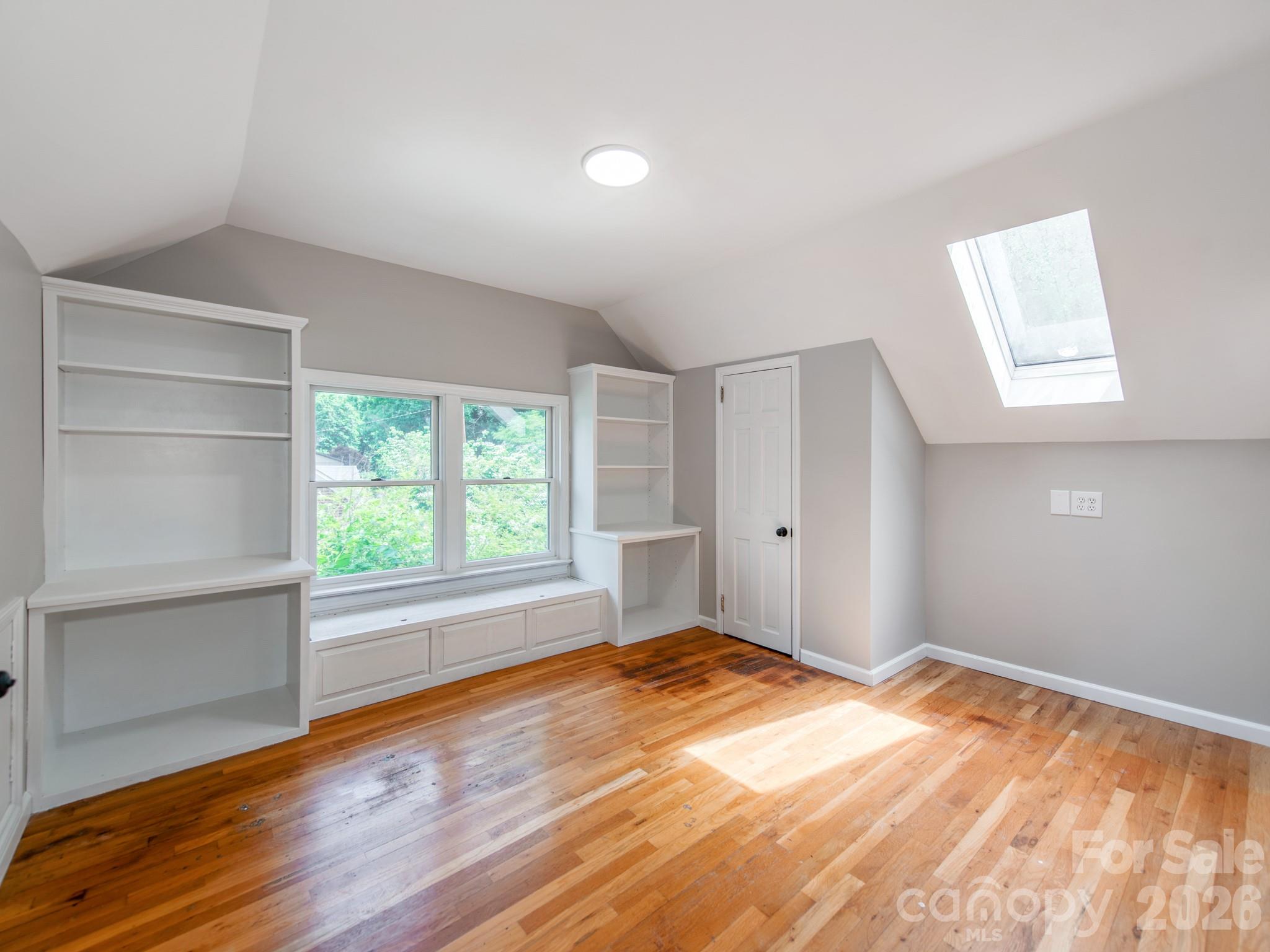 113 Falls Street Morganton, NC 28655 - Photo 17 of 33 a view of empty room with wooden floor and fan