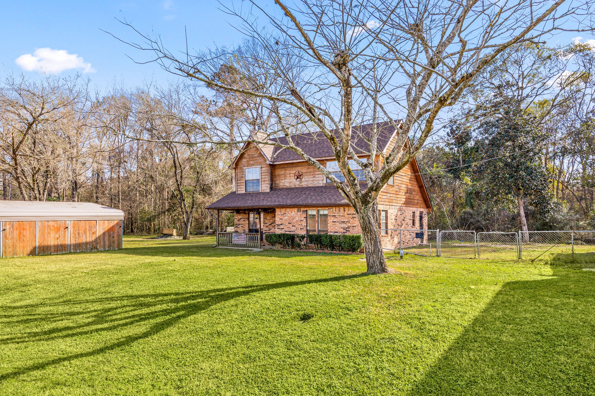 236 Pine Ridge Drive Cleveland, TX 77327 - Photo 2 of 22 Beautiful country living on 1/3 acre