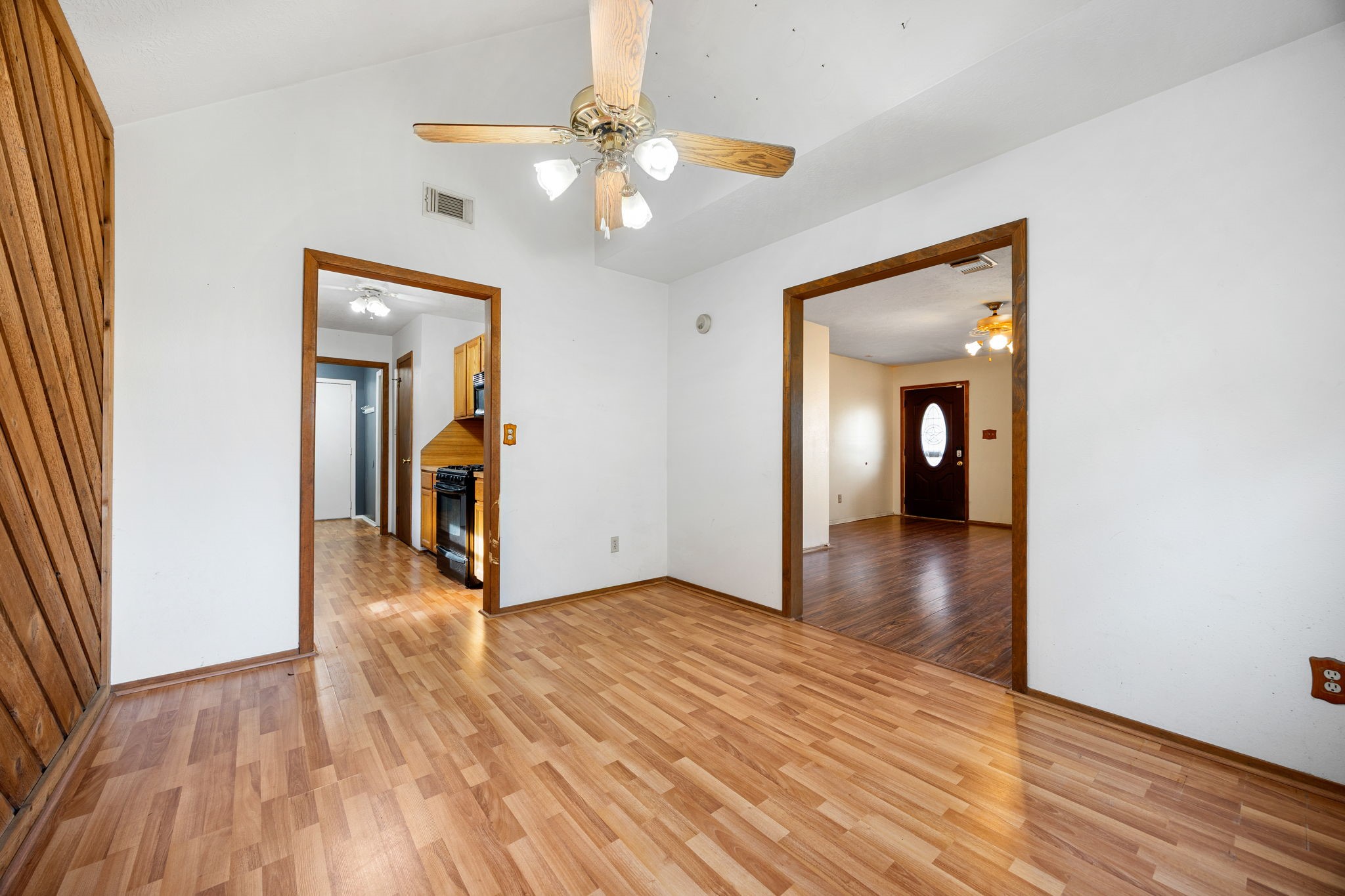236 Pine Ridge Drive Cleveland, TX 77327 - Photo 4 of 22 Formal dining room, open to kitchen and living room