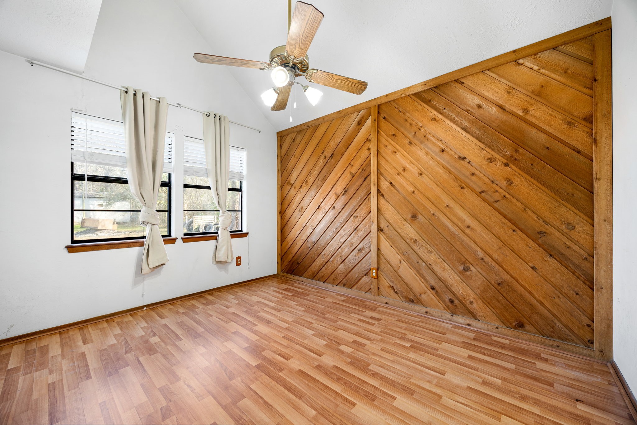 236 Pine Ridge Drive Cleveland, TX 77327 - Photo 5 of 22 Stylish accent wall in dining room