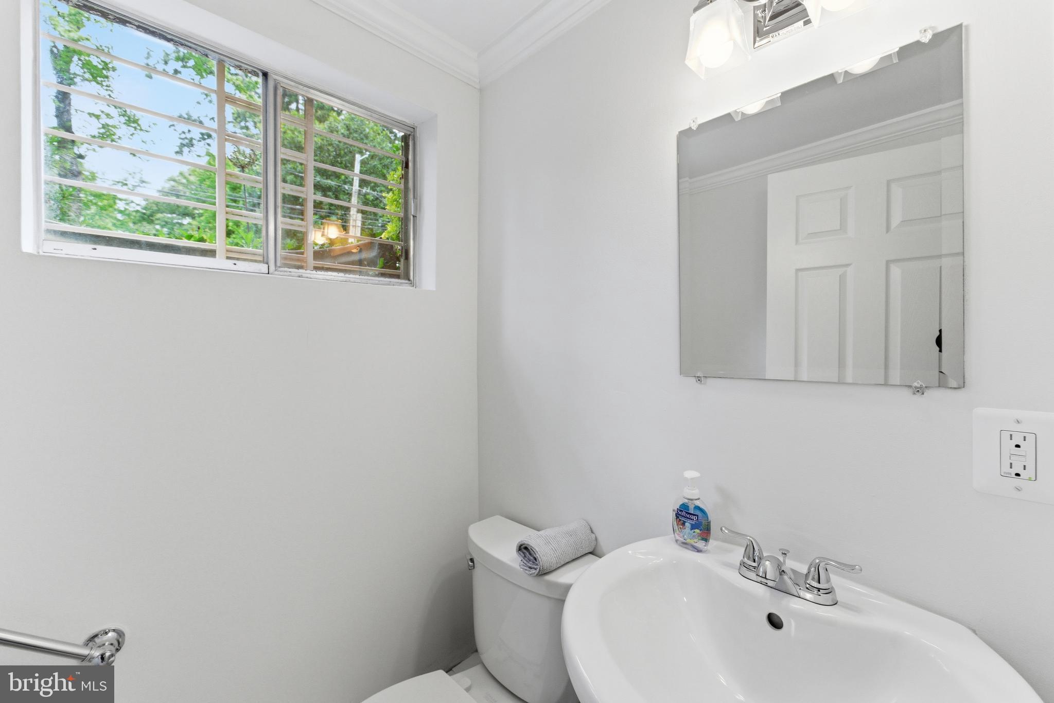 2100 Edgewater Parkway Silver Spring, MD 20903 - Photo 40 of 46 a bathroom with a sink and a toilet