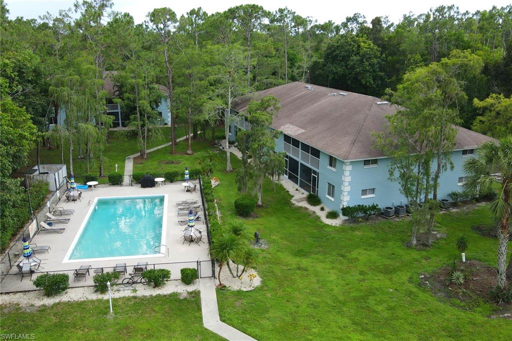 5675 Whitaker Road, Unit B202 Naples, FL 34112 - Photo 24 of 26 an aerial view of a house