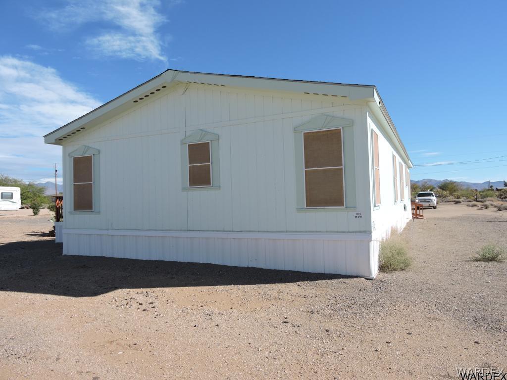 4053 Cove Road Golden Valley, AZ 86413 - Photo 4 of 20 a view of a house with a yard