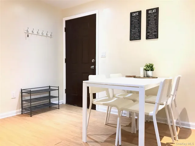 a view of a dining room with furniture