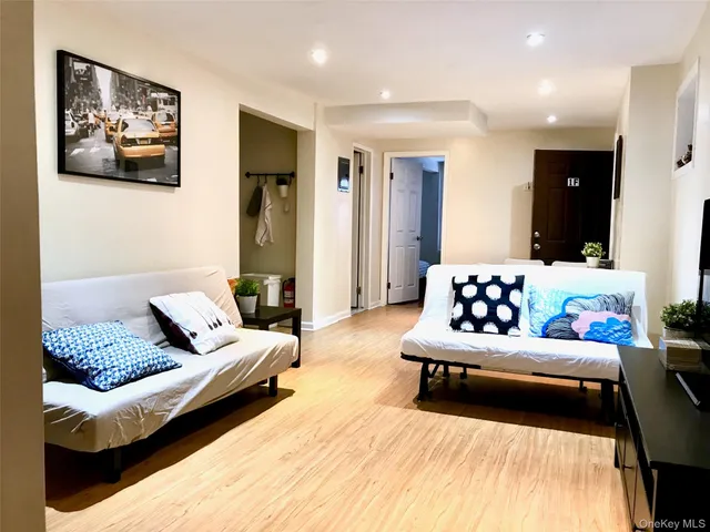 a bedroom with furniture and a couch