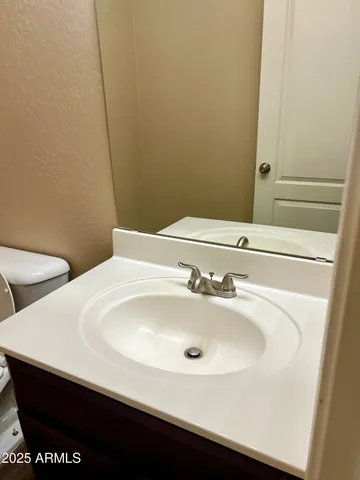 a bathroom with a sink and a toilet