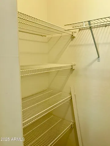 a bathroom with a shower and a shower head
