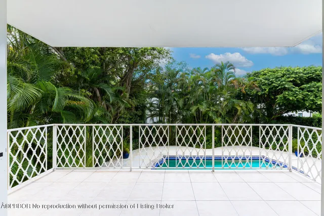 a view of a street with a bridge