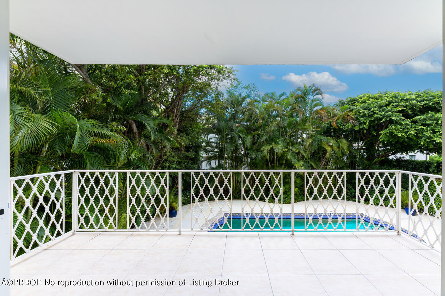 434 Chilean Avenue, Unit 2D Palm Beach, FL 33480 - Photo 6 of 19 a view of a street with a bridge