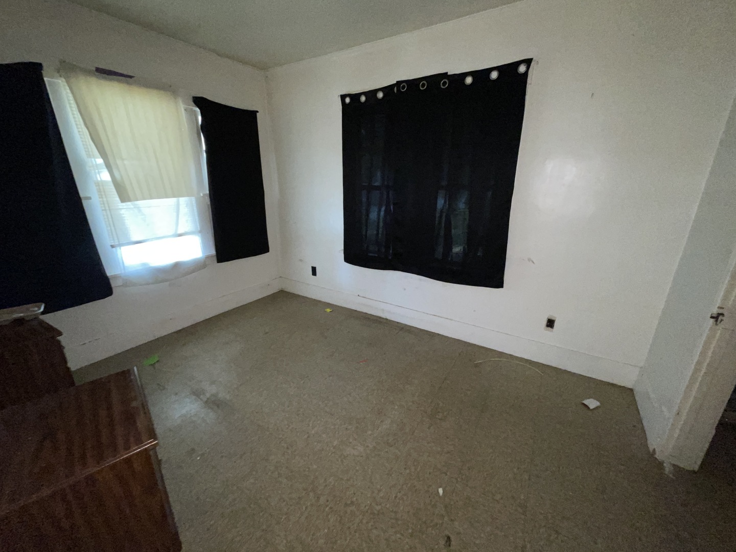 552 West Center Street Decatur, IL 62526 - Photo 10 of 26 a view of an empty room with wooden floor and a window