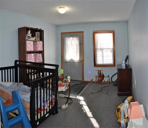 25 Shattuck Road Hadley, MA 01035 - Photo 9 of 26 a bedroom with furniture and a window